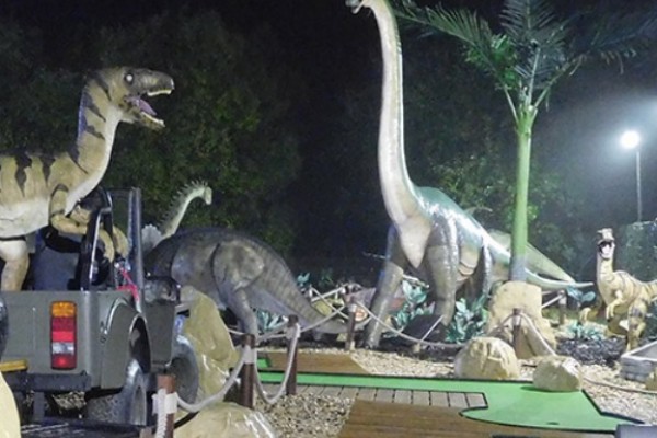 Image of Adventure Golf Berkshire surrounded by dinosaurs