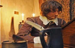 A room in Cromwell's House in Ely showing writer at work