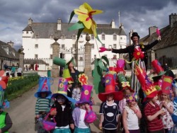 Kids having fun with Traquair House in the background