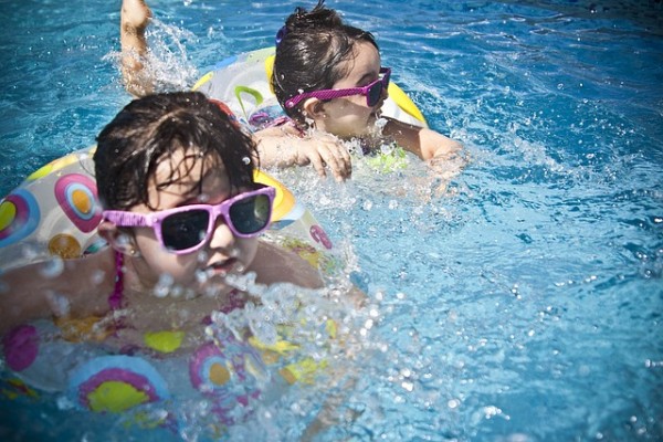 Kids enjoying their swim in the pool