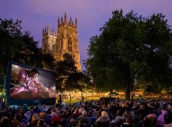 Families enjoying outdoor Cinema in York Families enjoying outdoor Cinema in York