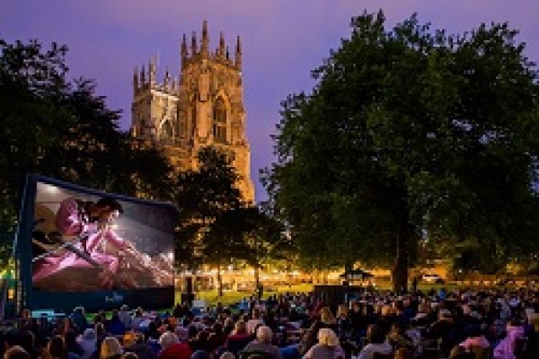 Families enjoying outdoor Cinema in York
